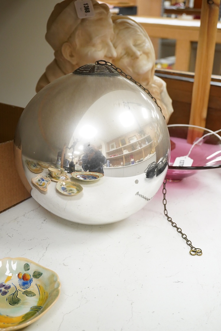 An early 20th century silver witches ball